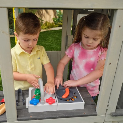 KidKraft Patio Party Wooden Outdoor Playhouse With Spinner Block Puzzle - 14pc - Image 4