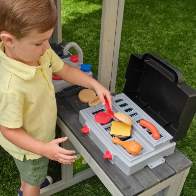 KidKraft Patio Party Wooden Outdoor Playhouse With Spinner Block Puzzle - 14pc - Image 2